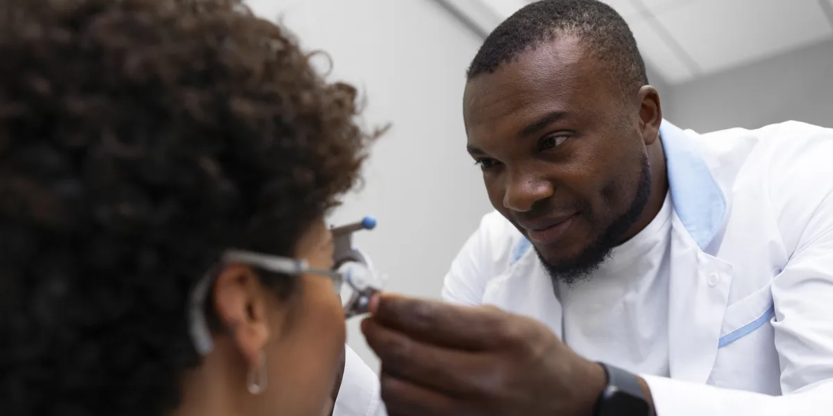 An eye specialist examining a patient’s eyes